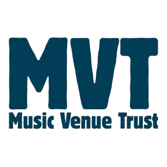 Music Venues Trust | Whitehouse Communications MVT Music Venue Trust logo in blue, with large MVT letters and 'Music Venue Trust' text below.